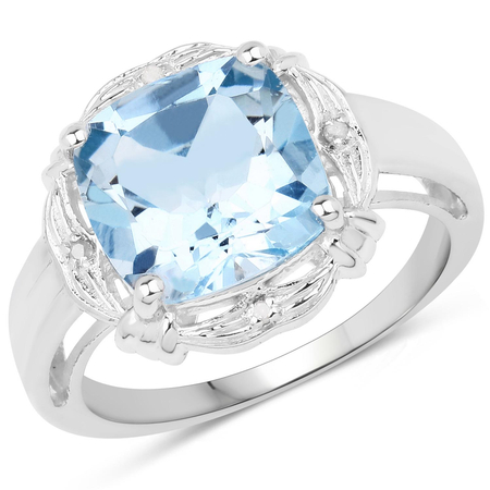 Srebrny pierścionek z dużym topazem niebieskim i diamentami